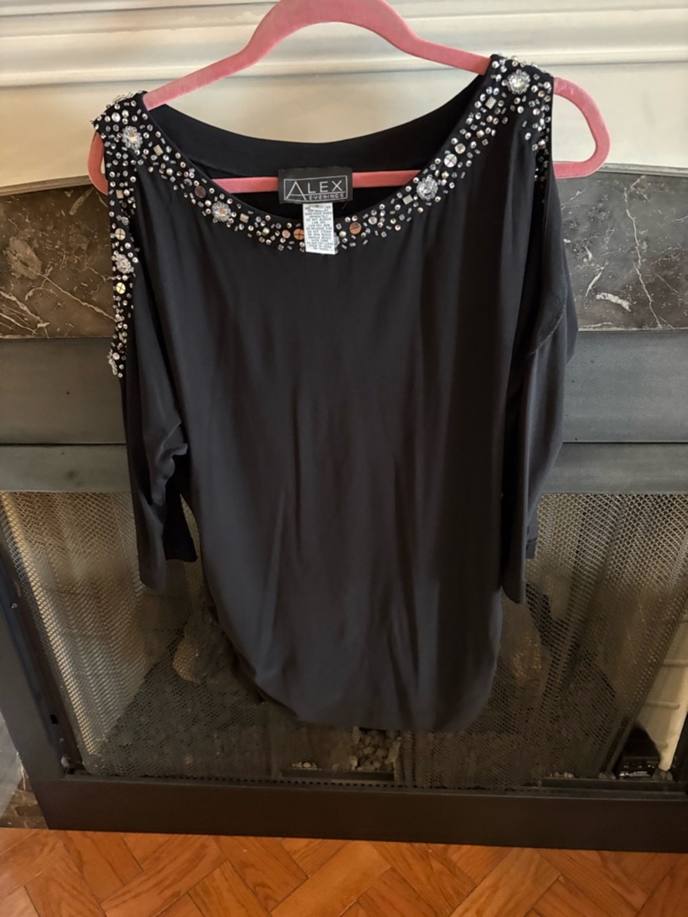 Alex Evenings Black dress or top. Neck and sleeves embellished with rhinestones